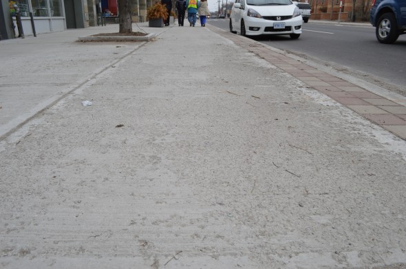 Crumbling sidewalk on Kingston Rd. between Warden and Manderley